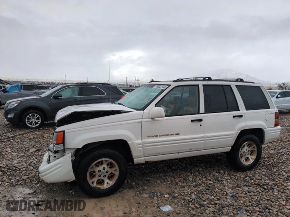 1996 Jeep Grand Cherokee Limited with VIN 1J4GZ78Y0TC185669, listed as a Copart auction lot 79032274 with 184,929 mi miles and Salvage Title. Bid and sale history available at carsss.com. Image 1.