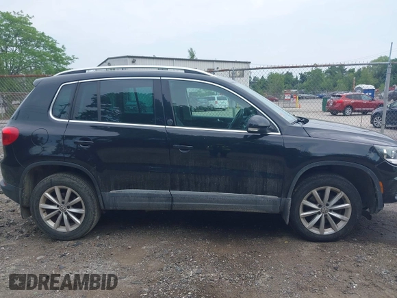 2017 Volkswagen Tiguan Wolfsburg Edition with VIN WVGSV7AX3HK037795, listed as a IAAI auction lot 42497812 with 86,211 mi miles and . Bid and sale history available at DreamBid. Image 13.