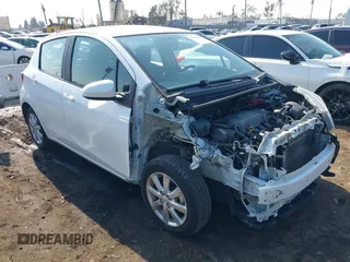 2015 Toyota Yaris L with VIN VNKKTUD30FA051732, listed as a IAAI auction lot 41449083 with 82,207 mi miles. Bid and sale history available at carsss.com. Image 1.