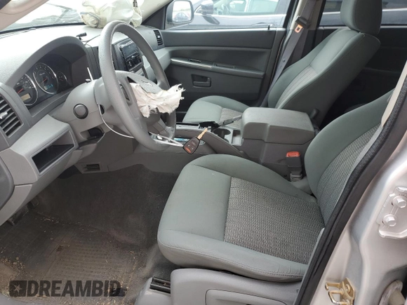2007 Jeep Grand Cherokee Laredo z VIN 1J8GR48K37C617623, wystawiony jako Copart lot #55875115 z przebiegiem 117 588 mil mil oraz Szkoda całkowita • Salvage title. Historia ofert i sprzedaży dostępna na DreamBid. Obrazek 7.