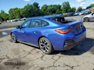 2022 BMW i4 M50 with VIN WBY33AW04NFM42431, listed as a Copart auction lot 60519024 with 53,447 mi miles and Salvage Title. Bid and sale history available at carsss.com. Image 2.