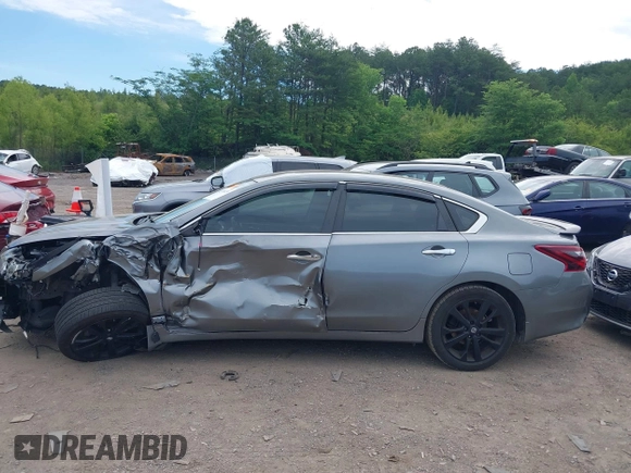 2017 Nissan Altima SV z VIN 1N4AL3AP4HC266324, wystawiony jako IAAI lot #42170025 z przebiegiem 127 595 mil mil oraz . Historia ofert i sprzedaży dostępna na DreamBid. Obrazek 14.