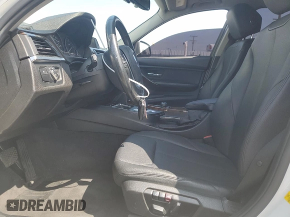 2015 BMW 3 Series 328i with VIN WBA3C1C51FP852887, listed as a Copart auction lot 58882695 with 146,823 mi miles and Salvage title. Bid and sale history available at DreamBid. Image 7.