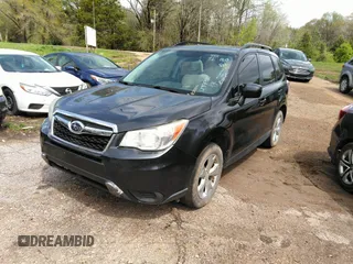 2014 Subaru Forester 2.5i Premium with VIN JF2SJAEC1EH477920, listed as a IAAI auction lot 41974390 with 145,837 mi miles. Bid and sale history available at carsss.com. Image 2.