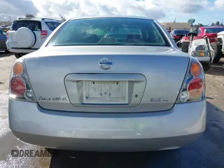 2003 Nissan Altima S with VIN 1N4AL11D43C354986, listed as a IAAI auction lot 41794579 with 135,238 mi miles. Bid and sale history available at carsss.com. Image 16.