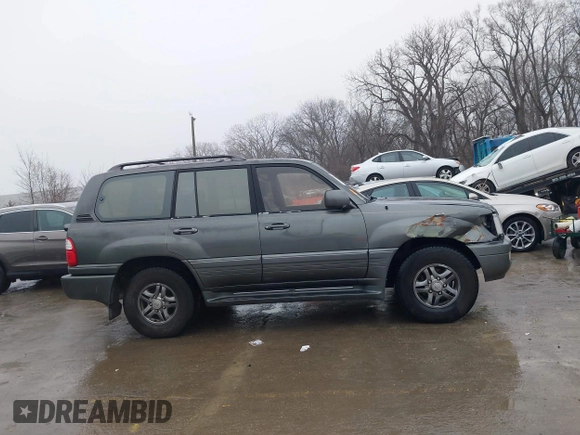 2002 Lexus LX 470 with VIN JTJHT00W923515897, listed as a IAAI auction lot 41155492 with 244,619 mi miles. Bid and sale history available at carsss.com. Image 13.