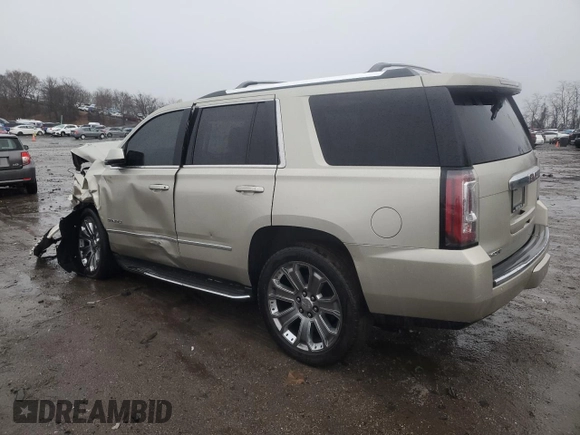 2015 GMC Yukon Denali with VIN 1GKS2CKJ3FR592707, listed as a Copart auction lot 47581575 with 121,326 mi miles and Salvage Title. Bid and sale history available at carsss.com. Image 2.