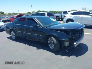2007 Cadillac DTS V8 z VIN 1G6KD57Y77U198880, wystawiony jako IAAI lot #42270269 z przebiegiem 176 468 mil mil oraz . Historia ofert i sprzedaży dostępna na DreamBid. Obrazek 1.