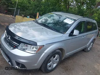 2012 Dodge Journey SXT with VIN 3C4PDDBG1CT323727, listed as a IAAI auction lot 42473238 with 77,035 mi miles and . Bid and sale history available at DreamBid. Image 6.