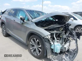 2019 Lexus RX 350L Premium z VIN JTJGZKCA5K2012847, wystawiony jako IAAI lot #42331497 z przebiegiem 100 945 mil mil oraz . Historia ofert i sprzedaży dostępna na DreamBid. Obrazek 1.