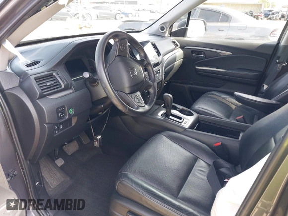 2020 Honda Pilot EX-L z VIN 5FNYF6H50LB047202, wystawiony jako IAAI lot #42117776 z przebiegiem 119 726 mil mil oraz . Historia ofert i sprzedaży dostępna na DreamBid. Obrazek 5.