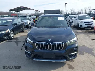 2019 BMW X1 xDrive28i with VIN WBXHT3C51K5L89758, listed as a IAAI auction lot 41535652 with 96,612 mi miles. Bid and sale history available at carsss.com. Image 12.