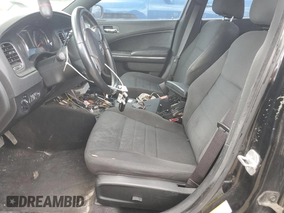 2012 Dodge Charger Police with VIN 2C3CDXAT7CH288137, listed as a Copart auction lot 63271415 with 272,393 mi miles and Clean title. Bid and sale history available at DreamBid. Image 7.