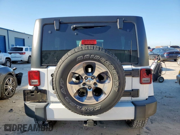 2016 Jeep Wrangler Unlimited Sahara z VIN 1C4HJWEG6GL218719, wystawiony jako Copart lot #56065235 z przebiegiem 96 061 mil mil oraz Szkoda całkowita • Salvage title. Historia ofert i sprzedaży dostępna na DreamBid. Obrazek 6.