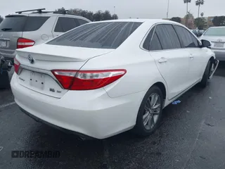 2017 Toyota Camry Hybrid LE with VIN 4T1BD1FKXHU213839, listed as a IAAI auction lot 41527665 with 113,345 mi miles. Bid and sale history available at carsss.com. Image 4.
