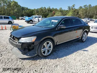 2014 Volkswagen Passat SEL Premium with VIN 1VWCS7A34EC007660, listed as a Copart auction lot 77766094 with 128,336 mi miles and Salvage Title. Bid and sale history available at carsss.com. Image 1.