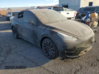 2023 Tesla Model Y Performance with VIN 7SAYGDEF5PF966796, listed as a Copart auction lot 88097325 with 6,927 mi miles and Salvage Title. Bid and sale history available at DreamBid. Image 4.