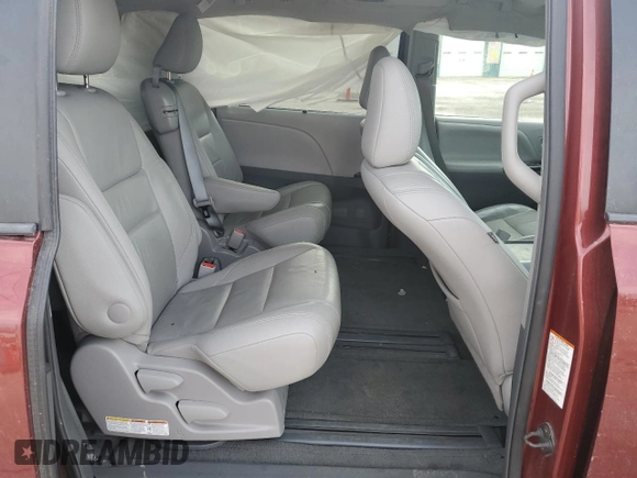 2015 Toyota Sienna XLE с VIN 5TDYK3DC1FS660766, выставлен на аукционе Copart как лот 53752845 с пробегом 166 253 миль миль и Списание • Salvage title. История ставок и продаж доступна на DreamBid. Изображение 10.