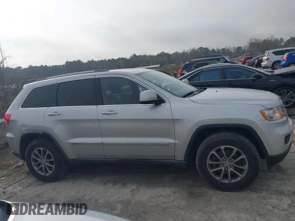 2012 Jeep Grand Cherokee Laredo with VIN 1C4RJFAG7CC189381, listed as a IAAI auction lot 41429085 with 137,238 mi miles. Bid and sale history available at carsss.com. Image 12.
