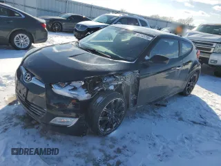 2015 Hyundai Veloster z VIN KMHTC6AD6FU218918, wystawiony jako Copart lot #45143755 z przebiegiem 110 936 mil mil oraz Czysty tytuł • Clean title. Historia ofert i sprzedaży dostępna na DreamBid. Obrazek 1.