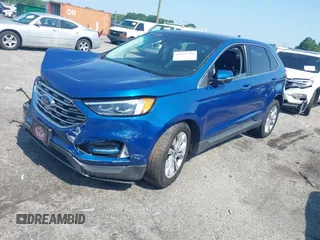 2020 Ford Edge Titanium with VIN 2FMPK4K96LBA55482, listed as a IAAI auction lot 42557716 with 61,509 mi miles and . Bid and sale history available at DreamBid. Image 16.