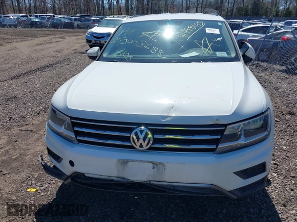 2018 Volkswagen Tiguan S z VIN 3VV1B7AX5JM043090, wystawiony jako IAAI lot #41998165 z przebiegiem Nie podano mil oraz . Historia ofert i sprzedaży dostępna na DreamBid. Obrazek 11.