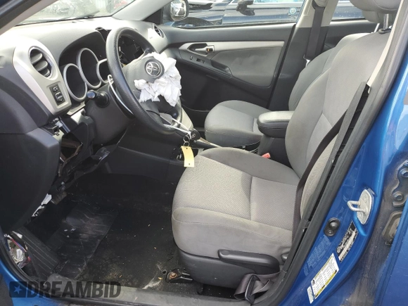 2009 Toyota Matrix S with VIN 2T1KE40E49C006626, listed as a Copart auction lot 79294614 with 176,275 mi miles and Salvage title. Bid and sale history available at DreamBid. Image 7.