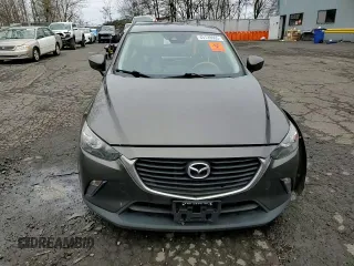 2018 Mazda CX-3 Sport z VIN JM1DKFB77J0312732, wystawiony jako Copart lot #45720065 z przebiegiem 99 866 mil mil oraz Szkoda całkowita • Salvage title. Historia ofert i sprzedaży dostępna na DreamBid. Obrazek 10.
