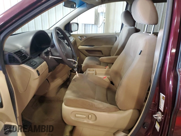 2010 Honda Odyssey EX with VIN 5FNRL3H47AB036925, listed as a Copart auction lot 57555365 with 178,790 mi miles and Salvage title. Bid and sale history available at DreamBid. Image 7.