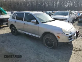 2004 Porsche Cayenne S with VIN WP1AB29P54LA76777, listed as a Copart auction lot 44341825 with 128,667 mi miles and Salvage Title. Bid and sale history available at carsss.com. Image 4.