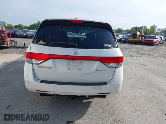 2014 Honda Odyssey Touring with VIN 5FNRL5H94EB001479, listed as a IAAI auction lot 41123678 with 147,269 mi miles and . Bid and sale history available at carsss.com. Image 16.