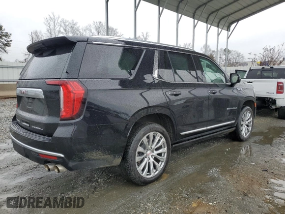 2023 GMC Yukon Denali with VIN 1GKS1DKL8PR402542, listed as a Copart auction lot 42001695 with 23,497 mi miles and Salvage Title. Bid and sale history available at carsss.com. Image 3.