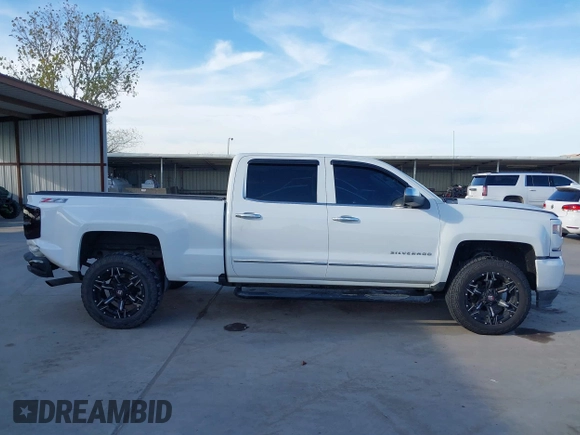 2016 Chevrolet Silverado 1500 LTZ with VIN 3GCUKSEJ0GG221628, listed as a IAAI auction lot 41276045 with 153,476 mi miles. Bid and sale history available at carsss.com. Image 14.