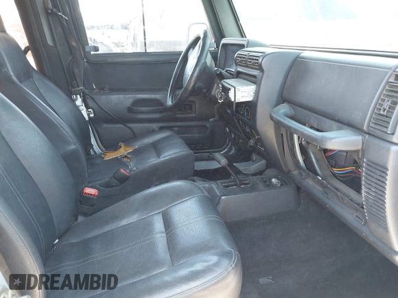 2004 Jeep Wrangler SE with VIN 1J4FA29134P715165, listed as a IAAI auction lot 42297821 with 109,397 mi miles and . Bid and sale history available at DreamBid. Image 5.