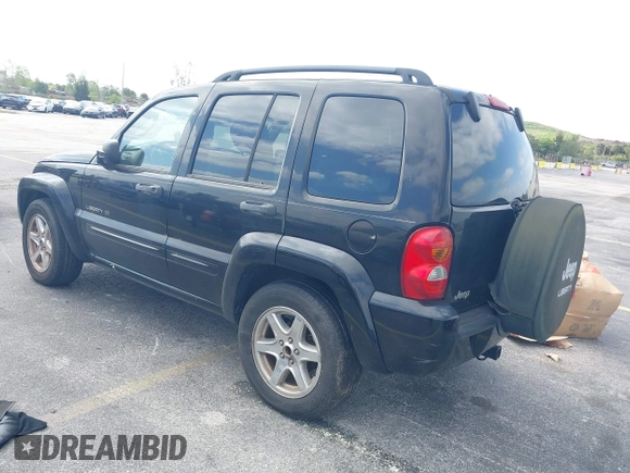 2003 Jeep Liberty Limited with VIN 1J4GK58K13W719457, listed as a IAAI auction lot 42088672 with 179,214 mi miles and . Bid and sale history available at carsss.com. Image 3.