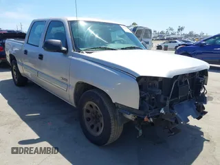 2005 Chevrolet Silverado 1500 LS z VIN 2GCEC13T651144009, wystawiony jako IAAI lot #42256681 z przebiegiem 116 074 mil mil oraz . Historia ofert i sprzedaży dostępna na DreamBid. Obrazek 1.