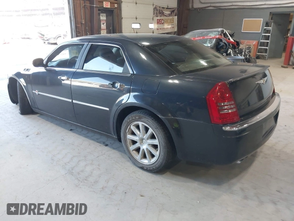 2006 Chrysler 300 C with VIN 2C3KA63H06H421414, listed as a IAAI auction lot 42144274 with 118,692 mi miles. Bid and sale history available at carsss.com. Image 3.