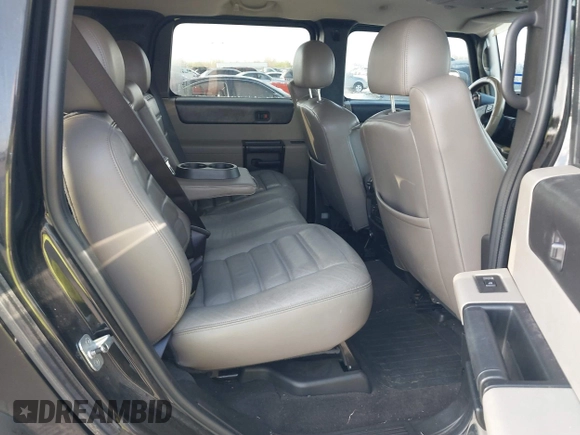 2006 Hummer H2 with VIN 5GRGN23U96H116719, listed as a IAAI auction lot 41781406 with 175,118 mi miles. Bid and sale history available at carsss.com. Image 8.