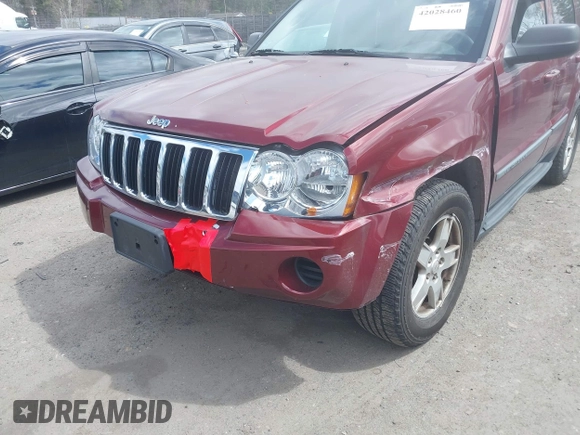 2007 Jeep Grand Cherokee Laredo with VIN 1J8GR48K27C518078, listed as a IAAI auction lot 42028460 with 121,530 mi miles. Bid and sale history available at carsss.com. Image 6.