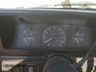 1990 Ford F-250 with VIN 1FTHF26H2LNA64235, listed as a Copart auction lot 74459134 with 249,821 mi miles and Salvage Title. Bid and sale history available at carsss.com. Image 9.