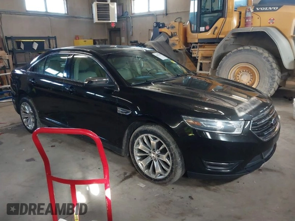 2015 Ford Taurus Limited with VIN 1FAHP2J87FG172580, listed as a IAAI auction lot 41891567 with 183,784 mi miles. Bid and sale history available at carsss.com. Image 1.