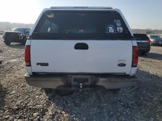 2002 Ford F-150 XL with VIN 1FTRF17262NA04126, listed as a Copart auction lot 51296715 with 98,710 mi miles and Salvage Title. Bid and sale history available at carsss.com. Image 6.