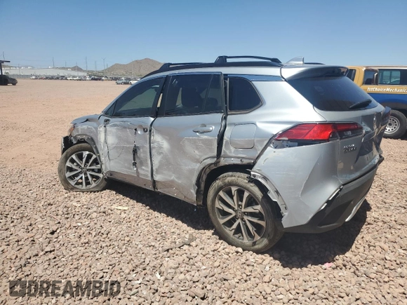 2023 Toyota Corolla Cross XLE with VIN 7MUDAAAG2PV050945, listed as a Copart auction lot 62237465 with 33,036 mi miles and Salvage title. Bid and sale history available at DreamBid. Image 2.