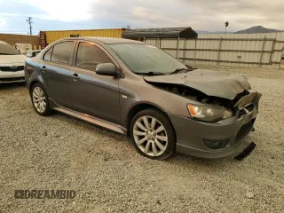 2011 Mitsubishi Lancer GTS with VIN JA32U8FW2BU005251, listed as a Copart auction lot 70879824 with 124,317 mi miles and Salvage Title. Bid and sale history available at carsss.com. Image 4.