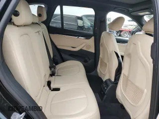 2018 BMW X1 xDrive28i with VIN WBXHT3C33J5L24195, listed as a Copart auction lot 38830283 with 35,004 mi miles. Bid and sale history available at carsss.com. Image 10.