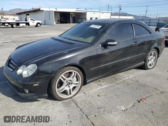 2009 Mercedes-Benz CLK 550 with VIN WDBTJ72H69F266105, listed as a Copart auction lot 79723224 with 114,840 mi miles and Salvage Title. Bid and sale history available at DreamBid. Image 1.