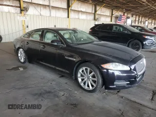 2013 Jaguar XJ z VIN SAJWA1C77D8V40055, wystawiony jako Copart lot #60461395 z przebiegiem 102 709 mil mil oraz Czysty tytuł • Clean title. Historia ofert i sprzedaży dostępna na DreamBid. Obrazek 4.