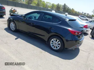 2015 Mazda 3 i Touring with VIN 3MZBM1L74FM179349, listed as a IAAI auction lot 42110874 with 117,232 mi miles and . Bid and sale history available at carsss.com. Image 3.