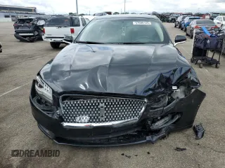 2017 Lincoln MKZ Reserve with VIN 3LN6L5E96HR648522, listed as a Copart auction lot 57698155 with 106,379 mi miles and Salvage title. Bid and sale history available at DreamBid. Image 5.