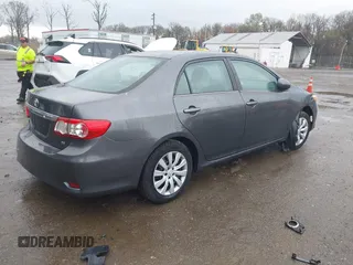 2013 Toyota Corolla L with VIN 2T1BU4EE4DC086921, listed as a IAAI auction lot 41923208 with 124,728 mi miles and . Bid and sale history available at DreamBid. Image 4.